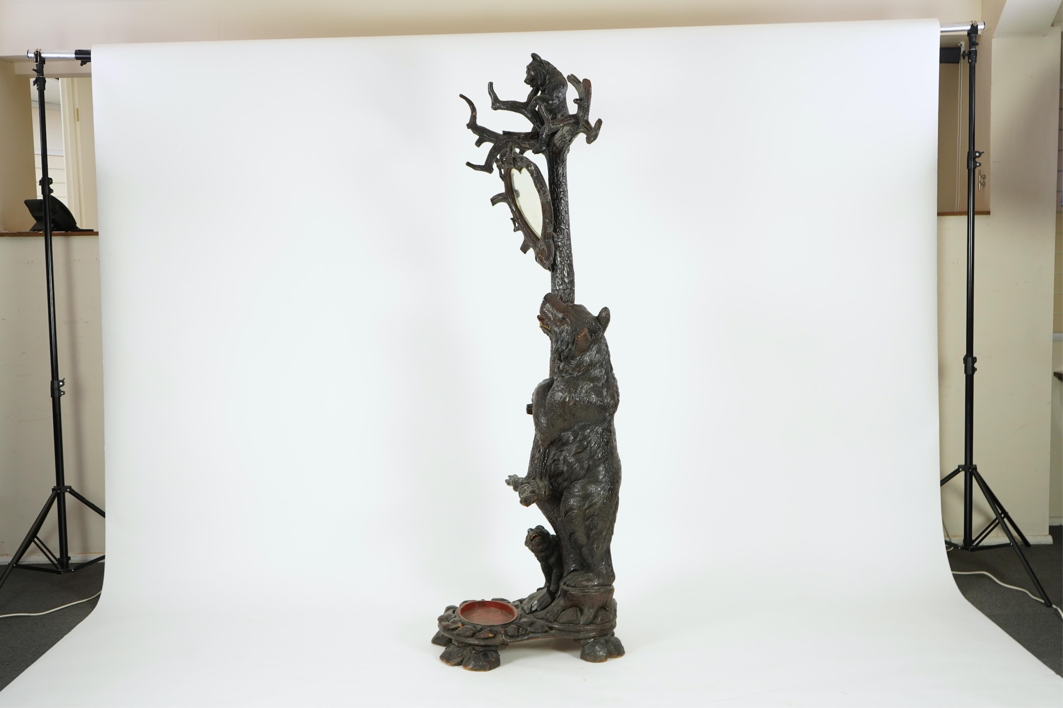 A late 19th century Black forest carved bear hallstand